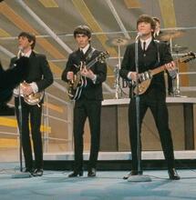 The Beatles performing at the Ed Sullivan Show.
