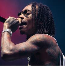  Wiz Khalifa condamné à 9 mois de prison en Roumanie aprés avoir fumé un joint sur scène