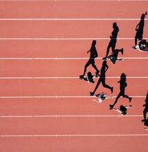 bird perspective of athletes running.