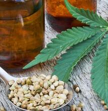 cannabis leaf and bottle