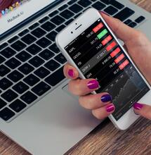 checking stock market prices.