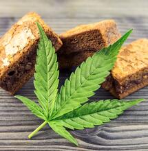 brownies along with a leaf of cannabis. 