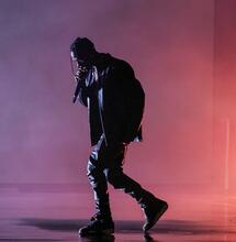 Travis Scott performing on stage