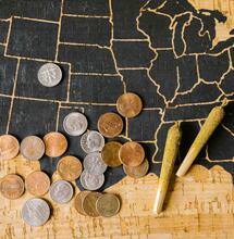 map of the usa with coins and joints.