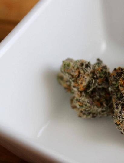 a dish with a chunk of weed.