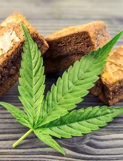 brownies along with a leaf of cannabis. 