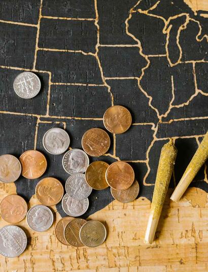 map of the usa with coins and joints.