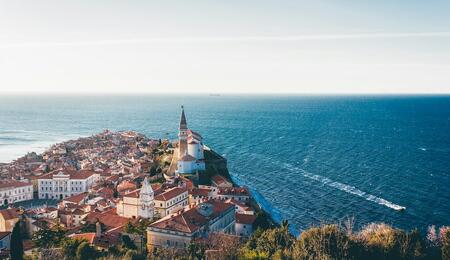 panorama image of the seaside town of Piran in Slovenia, the small European country where medical cannabis was approved by lawmakers in July, 2025. 