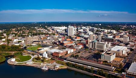 Alabama legalized medical cannabis in 2021, but legal battles and regulatory gridlock leave five million residents relying on a single store in Montgomery. 