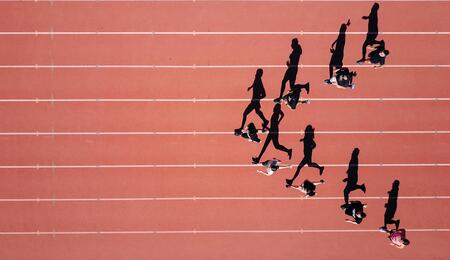 bird perspective of athletes running.