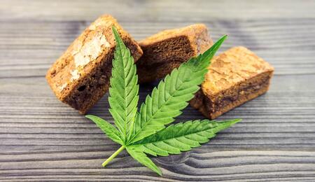 brownies along with a leaf of cannabis. 