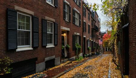 Read this travel story set in Boston’s streets and alleyways, where chance encounters, late-night walks, and shared joints reveal unexpected human connections.