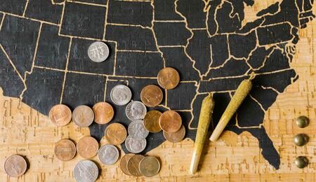 map of the usa with coins and joints.