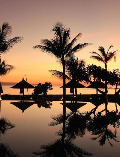 sunset beach view in Indonesia, the country where basketball player Jarred Shaw was arrested for possession of cannabis edibles  